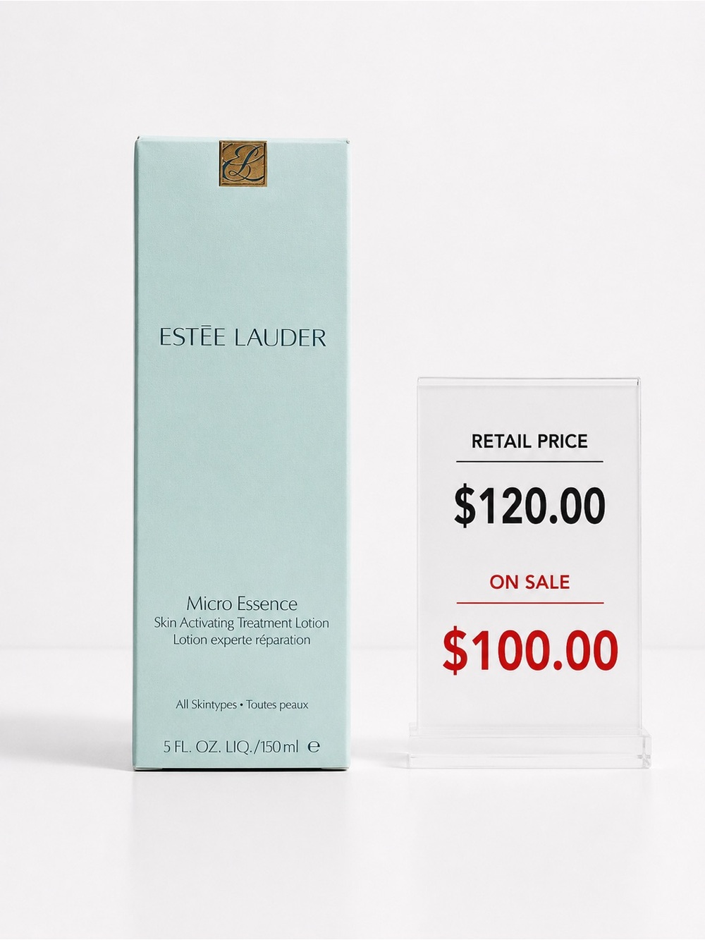 Estee Lauder Micro Essence Toner in Light Aqua and Gold Accent